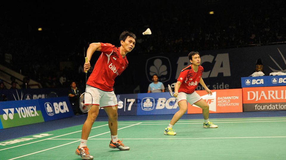  Hendra/Ahsan dengan mulus mengalahkan Ramussen/Sorensen 21-14 21-11 di Indonesia Open Super Series 2014 Copyright: &copy; Ratno Prasetyo/INDOSPORT